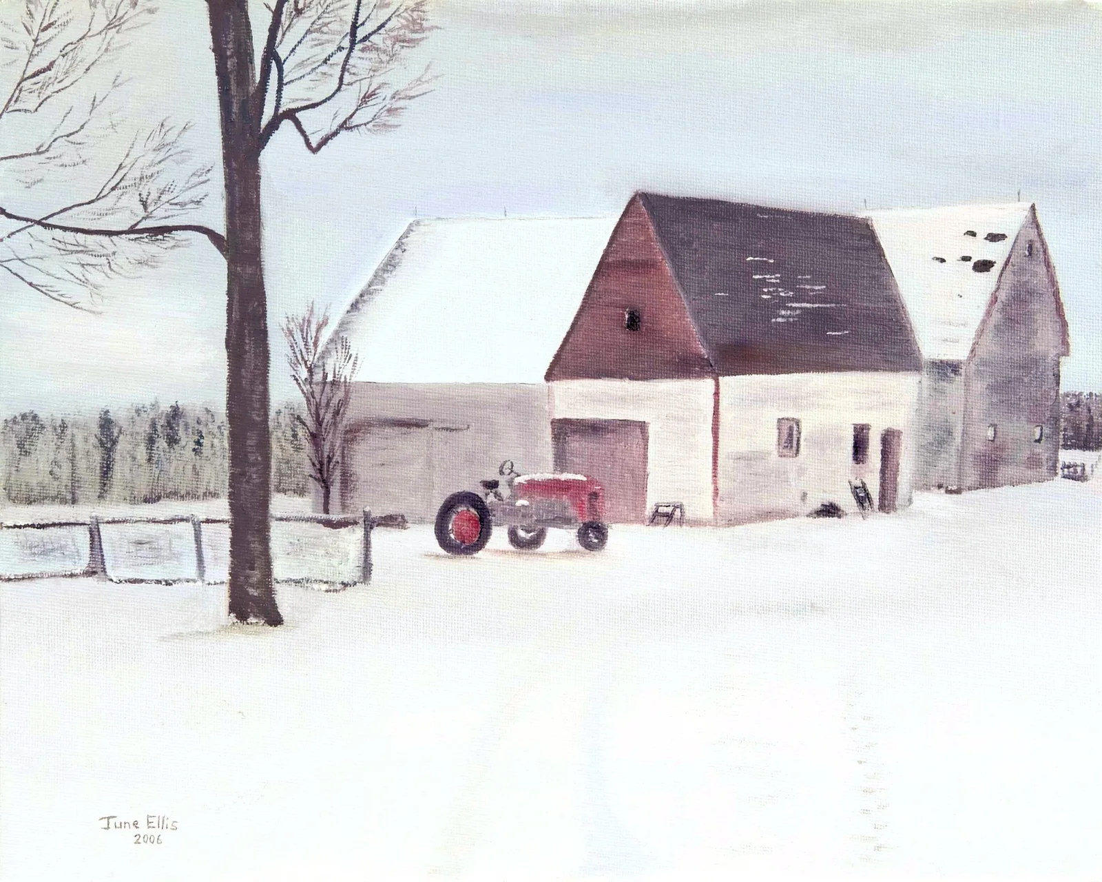 Snowy scene with antique tractor and barn in the background